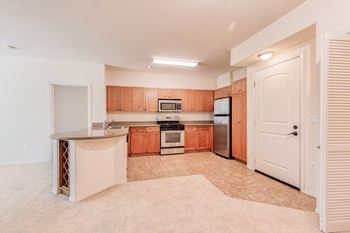 Round bistro-style counters with built-in wine racks in kitchens *
